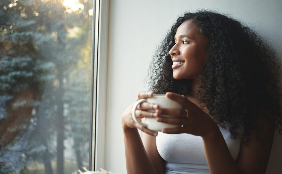 Morning routine. Portrait of happy charming young mixed race fem
